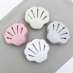 Поглотитель запаха для холодильника «Ракушка», 9,5×8,5×3 см, цвет МИКС Поглотитель запаха для холодильника «Ракушка», 9,5×8,5×3 см, цвет МИКС